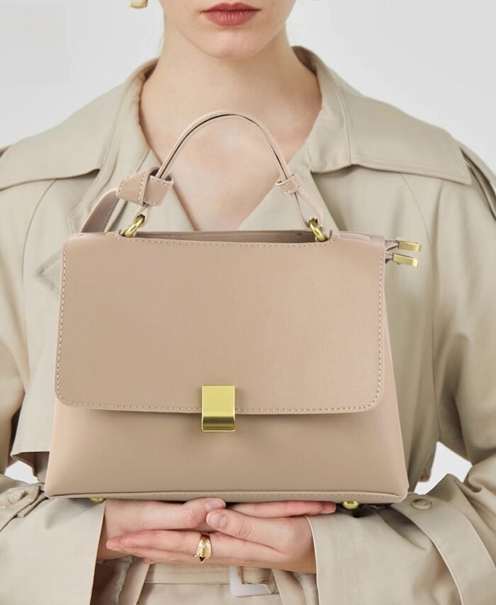 Simple solid color handbag with a slouchy shoulder strap